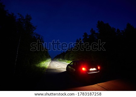 Similar – Image, Stock Photo Car riding along dirty road in evening forest