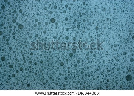 Blue texture with soap bubbles for a background and space filling