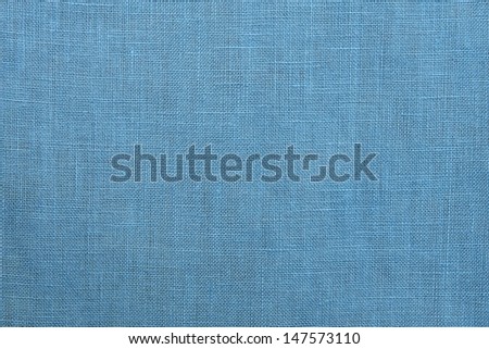 Texture of linen fabric of pale color for a background and a surface