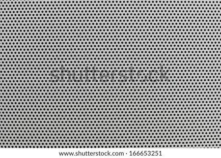Texture of a gray worn-out plastic grid with small round holes and openings, for a background, for wallpaper