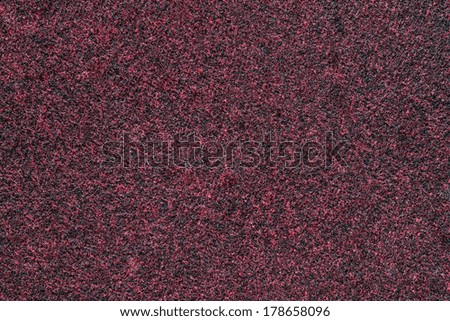 texture of red-black fleecy fabric for abstract backgrounds and wallpaper