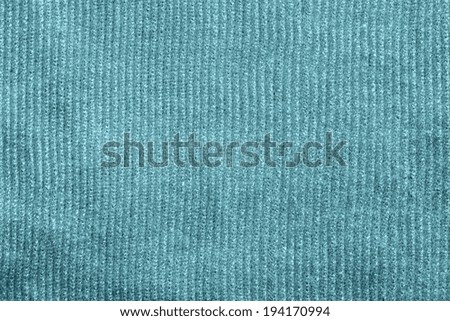 abstract texture of vertical corrugated and fluffy knitted fabric for a background  turquoise color