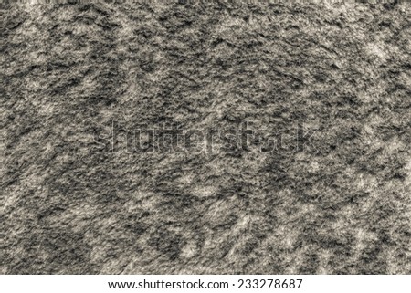 soft fluffy texture of pure fur fabric of beige color for empty backgrounds