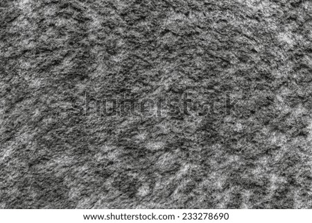 soft fluffy texture of pure fur fabric of gray color for empty backgrounds