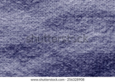 abstract texture of wadded fabric of violet or lilac color for empty and pure backgrounds