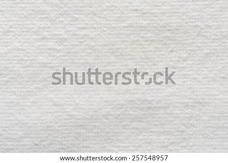 texture of quilted textile batting of white color for pure and empty backgrounds