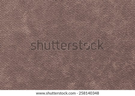 abstract grained texture of textile fabric of brown color for empty and pure backgrounds
