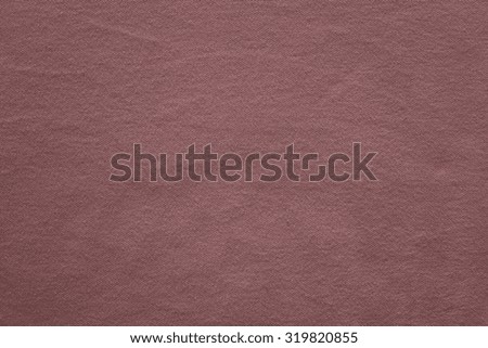 texture of knitted fabric of dark lilac color with a blank space for pure backgrounds