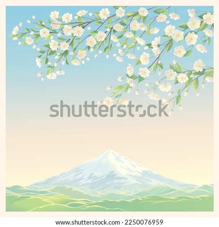 Spring landscape with flowering branch of a fruit tree  on foreground, and mountain on a background.