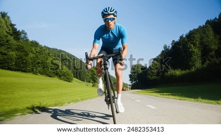 Similar – Image, Stock Photo Caucasian man riding a fixie