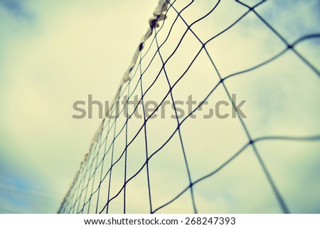 Volleyball net at the beach / Vintage photo image