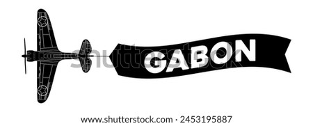 Gabon advertisement banner is attached to the plane