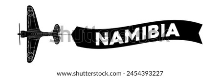 Namibia advertisement banner is attached to the plane