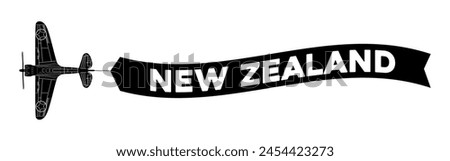 New Zealand advertisement banner is attached to the plane