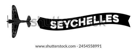 Seychelles advertisement banner is attached to the plane