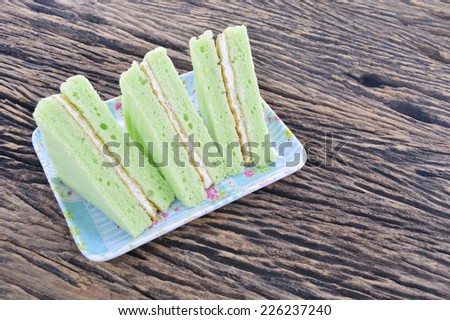 green chiffon cake on blue dish