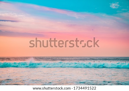 Similar – Image, Stock Photo Sunset sky over wavy sea with floating boats