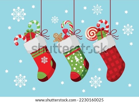 New Year's socks with sweets and gifts inside. background with snowflakes