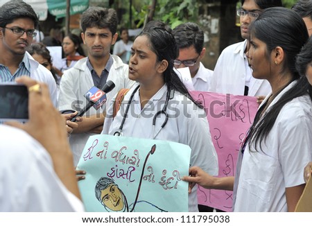 AHMEDABAD, INDIA - SEP 02: Medical students on strike, protesting against an exorbitant fee increase of 100% by the state municipality run medical school on September 02, 2012 in Ahmedabad, India