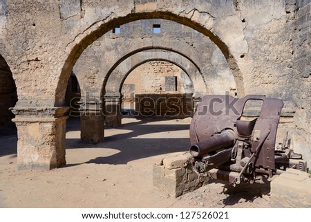 DIU, INDIA - JAN 14:Five hundred year old Portuguese Guns, made of steel, rusting away at the Diu Fort, an erstwhile Portuguese Colony in India on January 01, 2013 in Diu, India