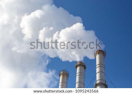 Similar – Industrial smoke stacks and beautiful cloudy sky