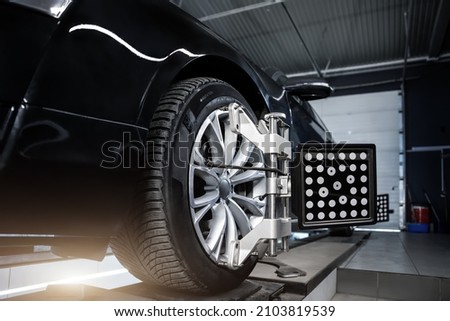 Similar – Image, Stock Photo Wheel repair shop axis