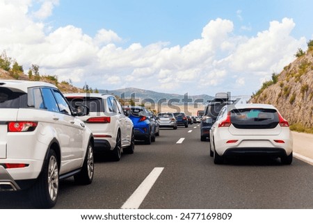 Similar – Foto Bild Autobahn mit Autos  und Schildern zur Geschwindigkeitsbegrenzung bei Nacht im dunkeln