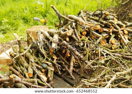 Wood pile with axe Foto stock © 
