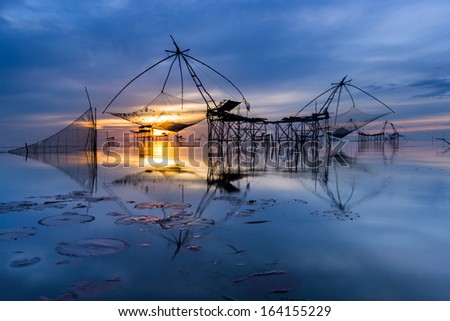 Fishing gear. Bamboo and netting. Of fishermen in Phatthalung Thailand On a beautiful morning light.