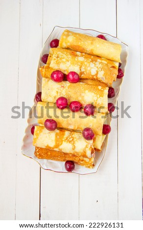 Pancakes stuffed with cottage cheese and berries