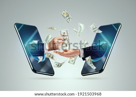 Hand from a smartphone transfers money to another hand. Online money transactions, mobile payments using a smartphone. Concept Financial growth, passive income, online business, dividends