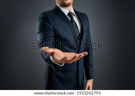 Similar – Image, Stock Photo male human hands holding small kitten