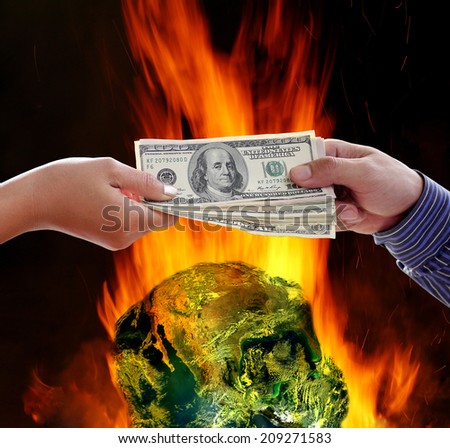 Handshake exchange on burning globe earth background. Element of this image furnished by NASA