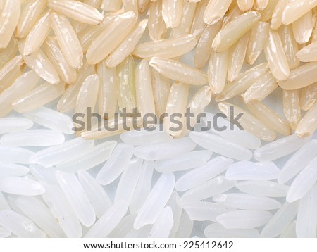 closeup of polished and unpolished raw rice