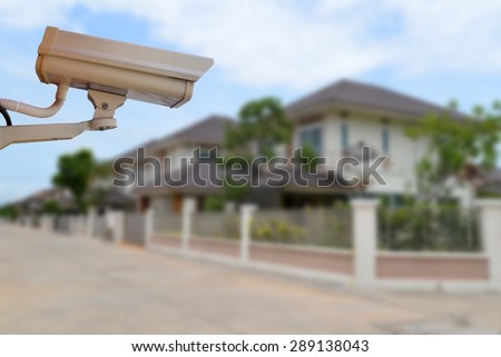 Security camera in housing