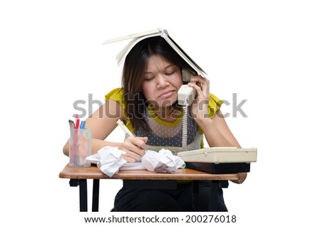 Boring  worker woman talking on the phone and writing notes in office