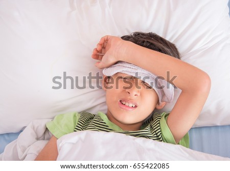 Similar – Image, Stock Photo Sad boy in medical mask near window