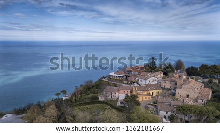aerial view of the village of casteldimezzo in the province of pesaro in the marche region in Italy. The village overlooks the cliff overlooking the Adriatic Sea located in the San Bartolo park Imagine de stoc © 