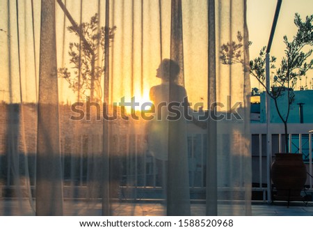 Similar – Foto Bild Frau auf dem Balkon mit Blick auf die Stadt von oben