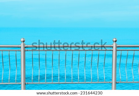sea promenade metallic fence abstract background  summer holidays