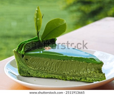 Image, Stock Photo Matcha cheesecake slice tart. Green cake slices equally