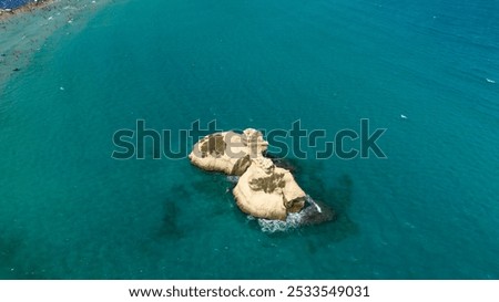 Similar – Image, Stock Photo The Two Sisters stacks in front of the shore of Torre dell’Orso