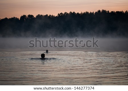 In foggy lake