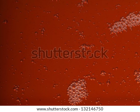 closeup - orange motor oil with bubbles texture background