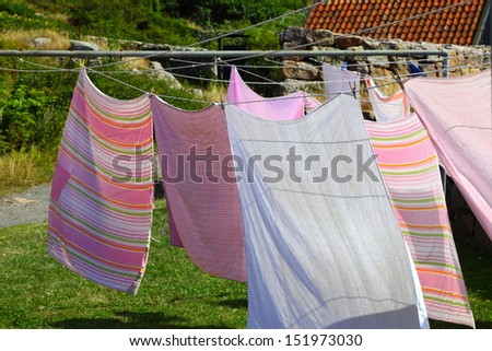 clothes hanging to dry on a laundry line outdoor