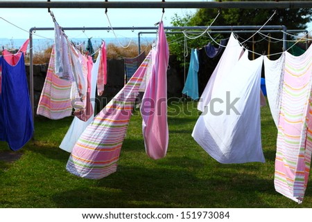 clothes hanging to dry on a laundry line outdoor
