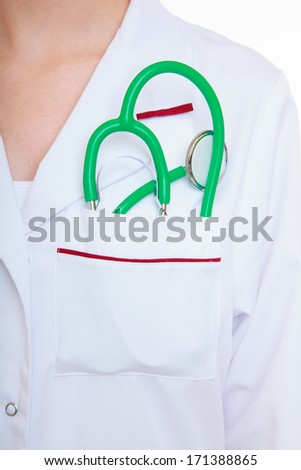 Female doctor or nurse with stethoscope inside lab coat pocket. Medical person for health insurance. Isolated on white background