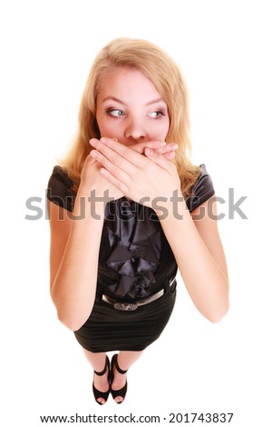 surprised woman shocked businesswoman in black dress covers mouth with hand isolated on white