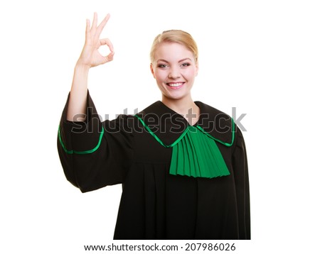 Law court or justice. Woman lawyer attorney wearing classic polish (Poland) black green gown showing ok okay success hand sign gesture isolated on white.