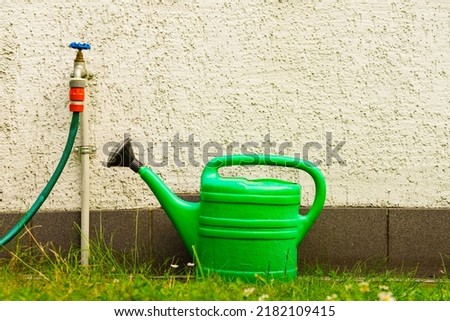 Similar – Image, Stock Photo Gardening with watering can, spade and shovel